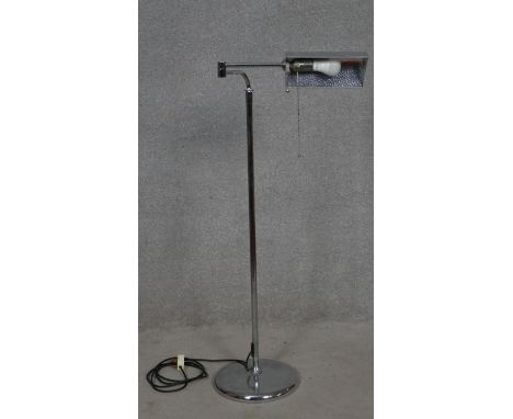 A contemporary chrome adjustable standard reading lamp. H.111 to 165cm 