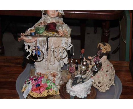 COLLECTION OF DOLLS AND HAT PINSincluding 'Millwards Gold Seal' advertisement doll, 41cm tall; ceramic pin cushion, 17cm wide