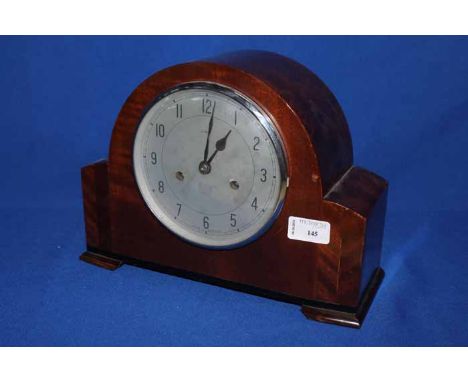 ART DECO MAHOGANY MANTEL CLOCKwith silvered dial with Arabic numerals, with two train movement; together with an attractive E
