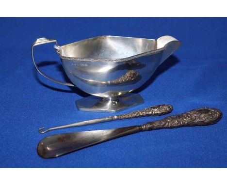 SILVER QUATREFOIL SAUCE BOAT, BIRMINGHAM also a shoe horn and button hook and a three piece christening set, in case