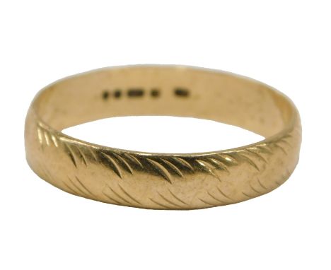 A 9ct gold wedding band, with etched design, ring size Q½, 2.2g all in.