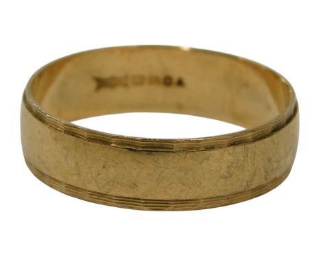 A 9ct gold wedding band, the outer border of petalated design, ring size B½, 2.8g all in.