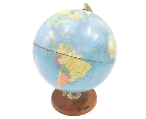 A vintage 12" Philips Political Challenge globe, on a wooden base.