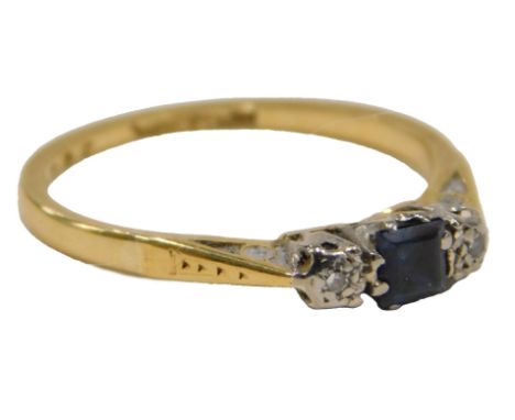 A sapphire and diamond three stone dress ring, the central square cut sapphire claw set, flanked by two tiny illusion set dia