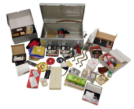 A quantity of magician's magic tricks, in aluminium carrying case.
