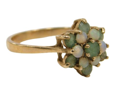 A 9ct gold cluster ring, set with halos of emeralds and opals, ring size N½, 2.6g.