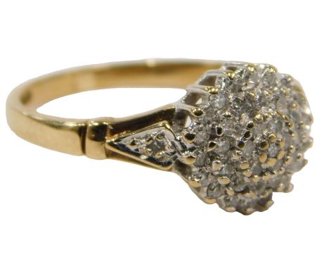 A 9ct gold diamond cluster ring, the three halo central diamond cluster with tiny diamond set shoulders, ring size M½, 2.3g a