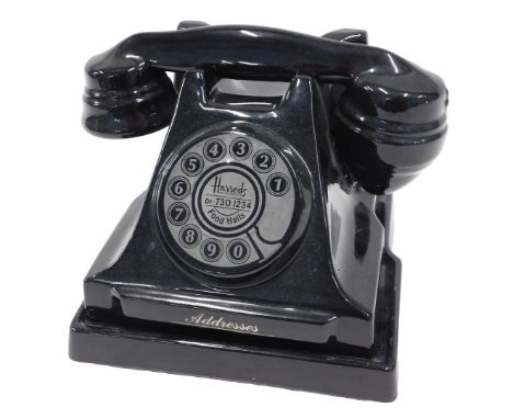 A Harrod's Food Hall novelty butter dish, modelled in the form of a vintage telephone, 23cm wide.