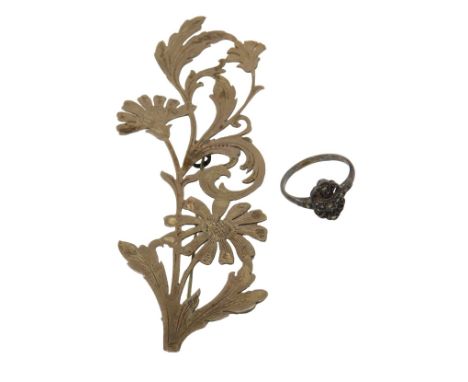 Two pieces of jewellery, comprising a floral bar brooch, white metal unmarked, 11cm wide, on single pin back, and a white met