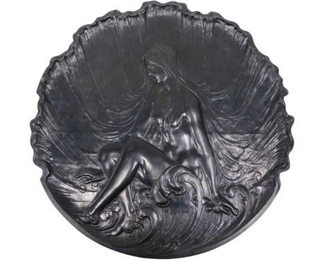 A cast iron Art Nouveau plaque, decorated with a female nude, 53cm diameter.