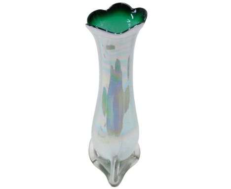 A large opalescent white opaque Art Glass vase, with green interior, and three feet, possibly Bohemian, 47cm high.