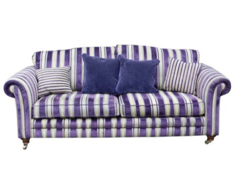 An Alstons Grafton sofa, with gold and purple striped fabric on square tapering legs, with brass castors, 218cm wide.