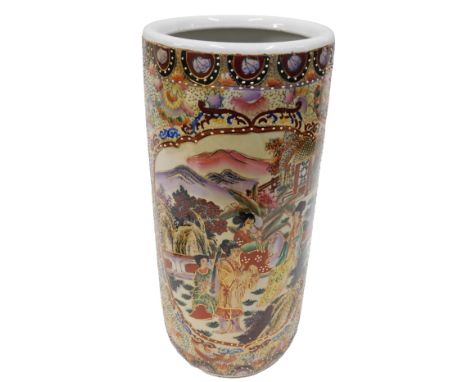 A 20thC Chinese ceramic umbrella stand, on highly decorated ground with figures of geishas by palm trees, 36cm high.