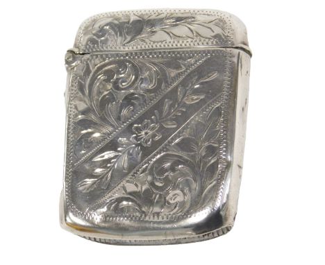 An Edward VII silver vesta case, with engine engraved floral scroll and flower decoration, Birmingham 1907, 0.61oz.