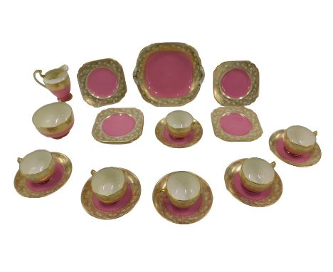 A Jackson &amp; Gosling Ltd Grosvenor china part tea service, decorated in pink and gilt.