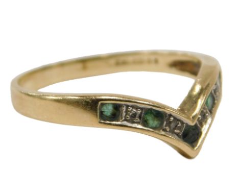 A 9ct gold wishbone ring, set with emeralds and diamonds, ring size N½, 1.9g all in.