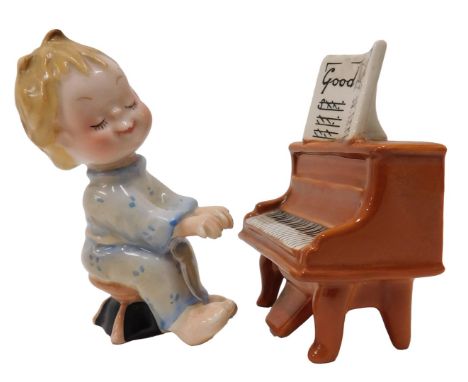A Beswick ceramic child pianist, with piano. (2)