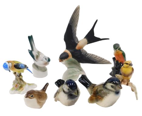 A quantity of ceramic birds, to include a Goebel swallow.