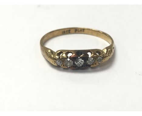 An 18ct gold five stone 1920s ring. The approximate ring size is P.