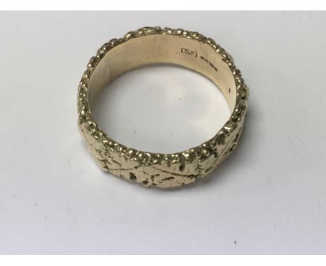 A 9 ct gold ring size S ,7 grams.