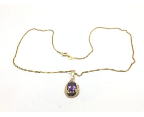 A 9ct gold amethyst pendant suspended on a gold chain, approx 4g.