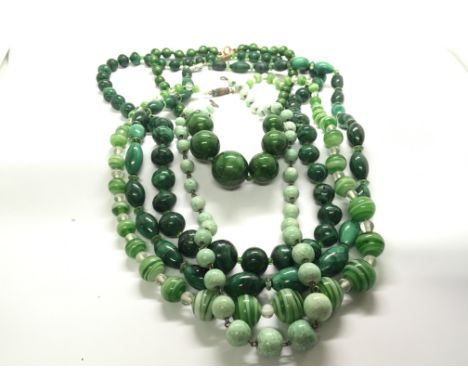 A collection of Vintage green malachite and other conforming colour bead necklaces.(5)