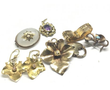 A leaf shaped brooch with matching earrings unmarked a pendent set with amethyst and one other cabochon brooch and other oddm