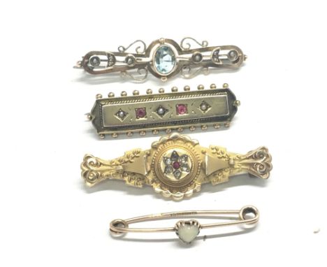 A collection of four gold bar brooches set with aquamarine ruby chip diamonds and seed pearl weight 11g (4)