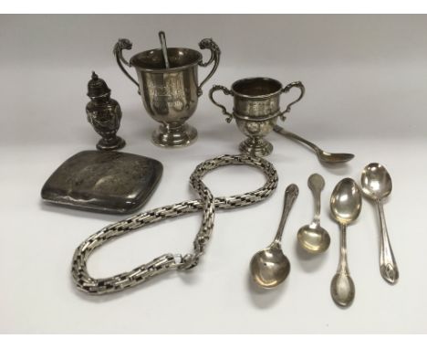 A collection of silver cups and other silver items including spoons etc.