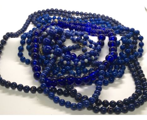 A collection of Vintage blue bead necklaces including Lapis Lazuli of very good length. (a lot)