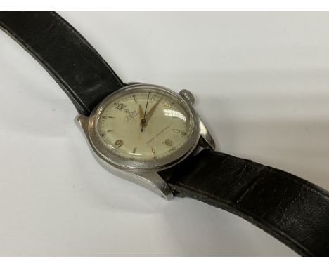 A vintage gents Tudor Oyster with serial number 75379 / 7803, number dates to 1958, seen working (32mm inc crown).