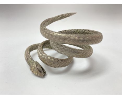 An unusual white woven metal snake bangle.