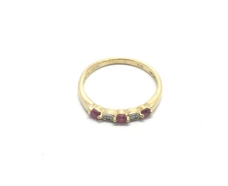 A 9ct gold five stone ruby and diamond ring, approx 1.4g and approx size L-M.