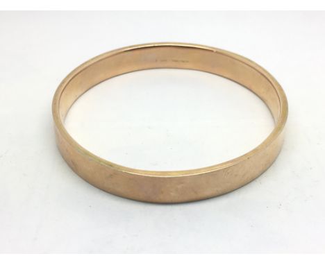 A 9ct gold bangle, approx 12.7g.
