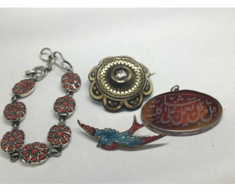 A Quality Pique work gold and silver brooch an enamel bird brooch a Kufic script pendent and a white metal bracelet (a lot)