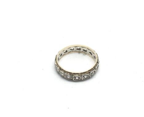 A 9ct gold white sapphire eternity ring, the stones set in heart shaped settings, approx 2.2g and approx size M-N.