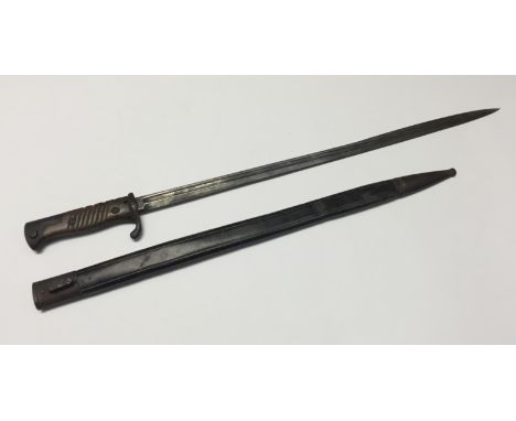 A WW1 German Gew M1898 bayonet, with leather scabbard. Dated 1914 to the spine, plus the makers mark of C.G.Haenel Suhl to th