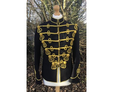 A vintage 19th Hussars troopers tunic, circa WW2 / interwar period. Dark blue wool, with yellow cord Austrian knots, brass ba