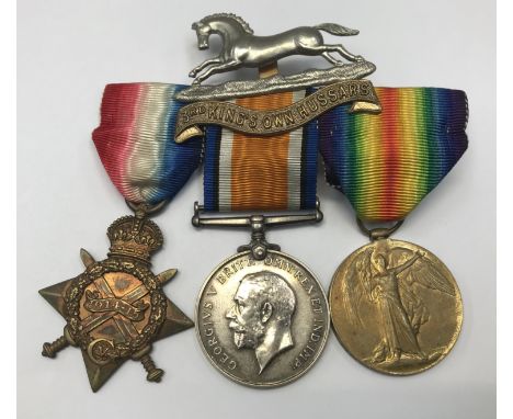 A 1915 Star trio, awarded to 23340 Pte D. Ham of the 3rd Hussars. To include: the 1915 Star, British War Medal, Victory Medal