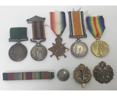 A selection of Victorian and WW1 medals, plus WW2 era badges. To include: a Victorian Volunteer Long Service Medal, unnamed a