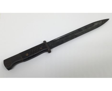 A WW2 era, German K98 Bayonet, dated 1939 to the spine. Blued single edged blade with fuller, marked E.u.F.Hörster at the ric