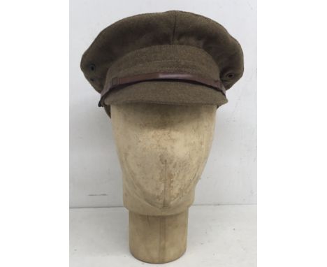 A fine WW1 era, 1917 pattern ‘Tommy’s’ trench cap. Manufactures mark for Reese & Bonn Ltd of London, and dated 1918, plus a b