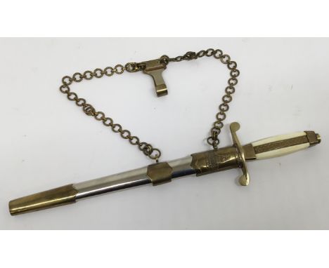 A M1951 Bulgarian army officers dagger, complete with scabbard and suspension chain. Moulded grips, with brass knot work band