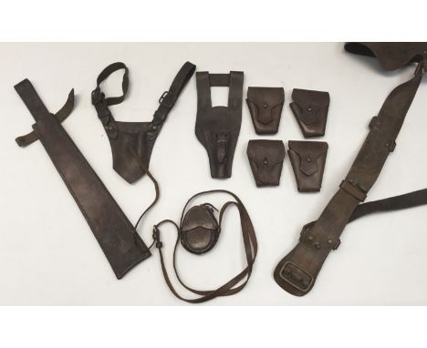 A selection of 19th and 20th century military leather equipment / pouches. To include: 4 x 1903 pattern bandolier pouches (wh