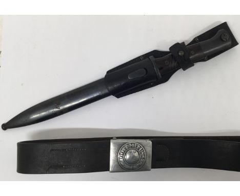 A pre-WW2, German K98 bayonet, with associated scabbard, leather frog, and leather belt fitted with an army belt buckle. The 