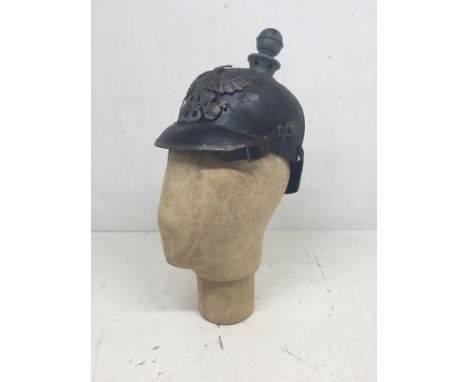 A WW1 era enlisted man’s Pickelhaube, fitted with the Prussian badge to the front. Usual leather skull, neck guard, and peak,