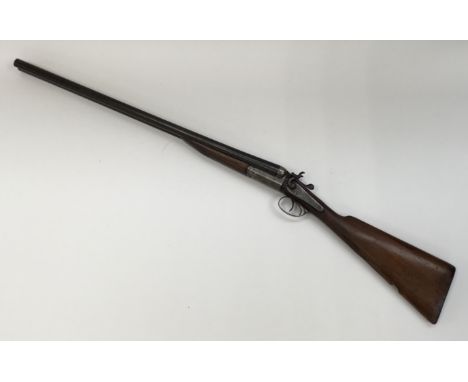 A 12 bore sbs hammer shotgun by Rosson of Derby, No.40066. 26” steel barrels with back action rebounding locks. Birmingham pr