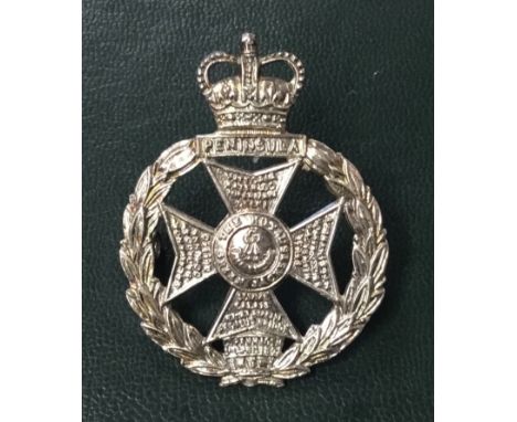 A vintage Royal Green Jackets sterling silver officer’s cap badge. Fully U.K. hallmarked to the reverse side for Birmingham 1