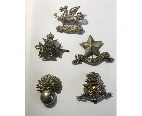 Collection of British Army cap badges, including The Buffs Royal East Kent Silver Plated Officers Cap Badge, The Cameronians 