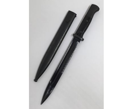 A WW2 era, German K98 bayonet, dated 1940 to the spine. Manufactured by Berg & Co, and complete with a matching numbered scab